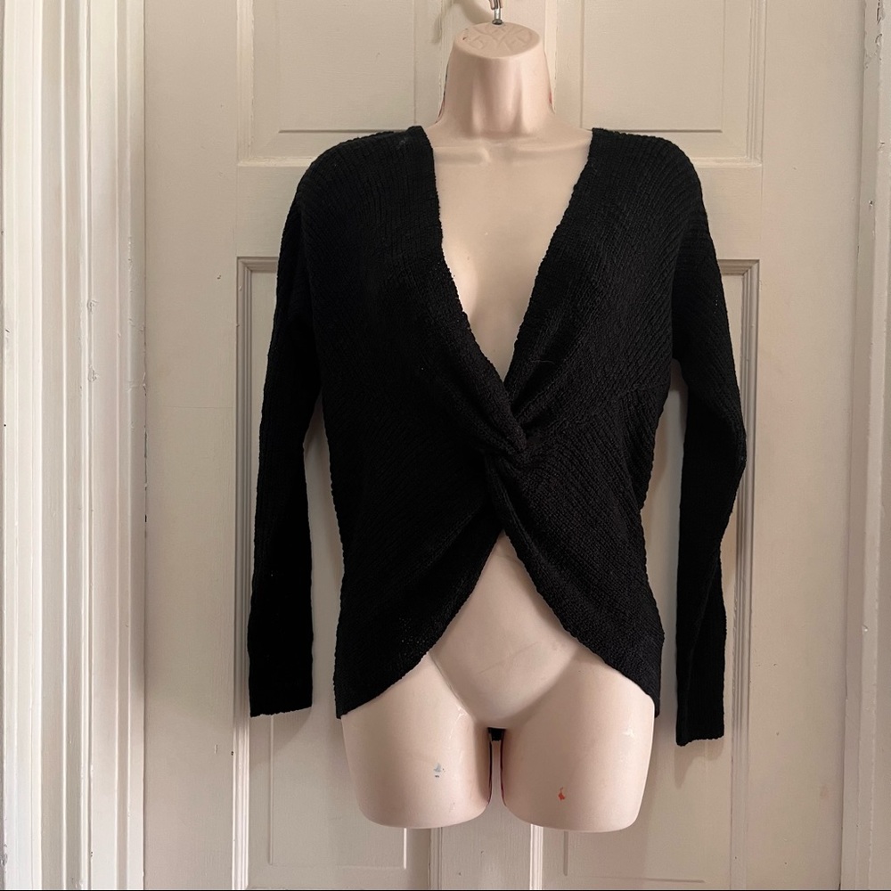 TWO sweaters both size S like new
